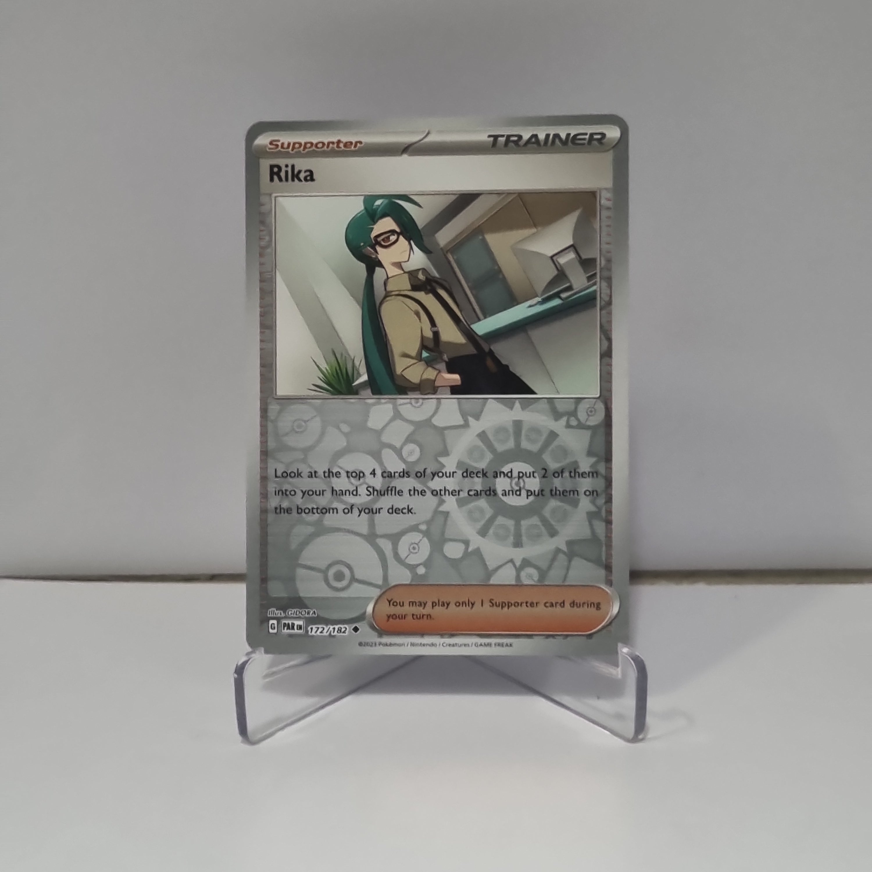 Pokemon TCG: Paradox Rift Reverse Holo card - Rika.