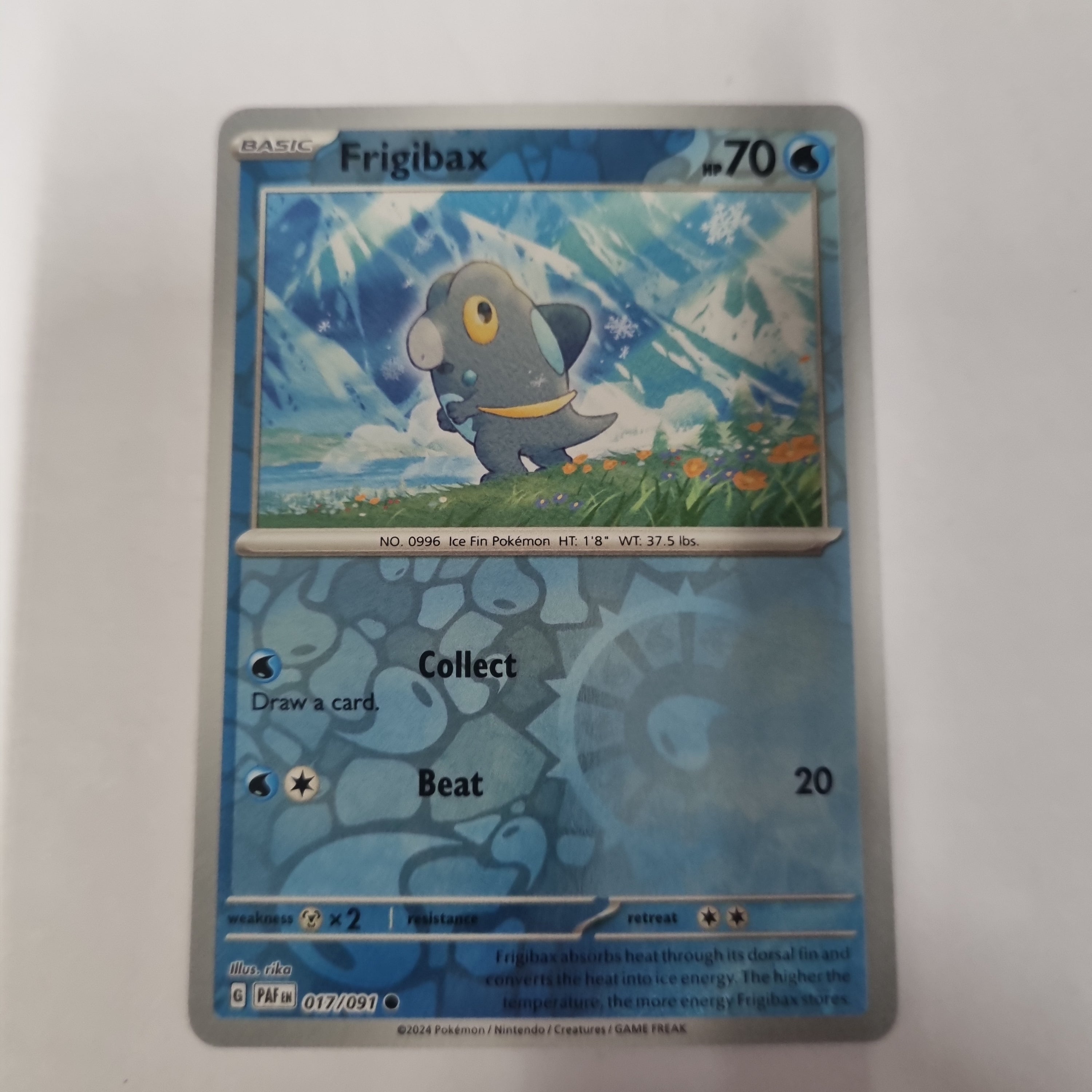 Pokemon TCG - Paldean Fates - #17 - Frigibax - common - Reverse Holo