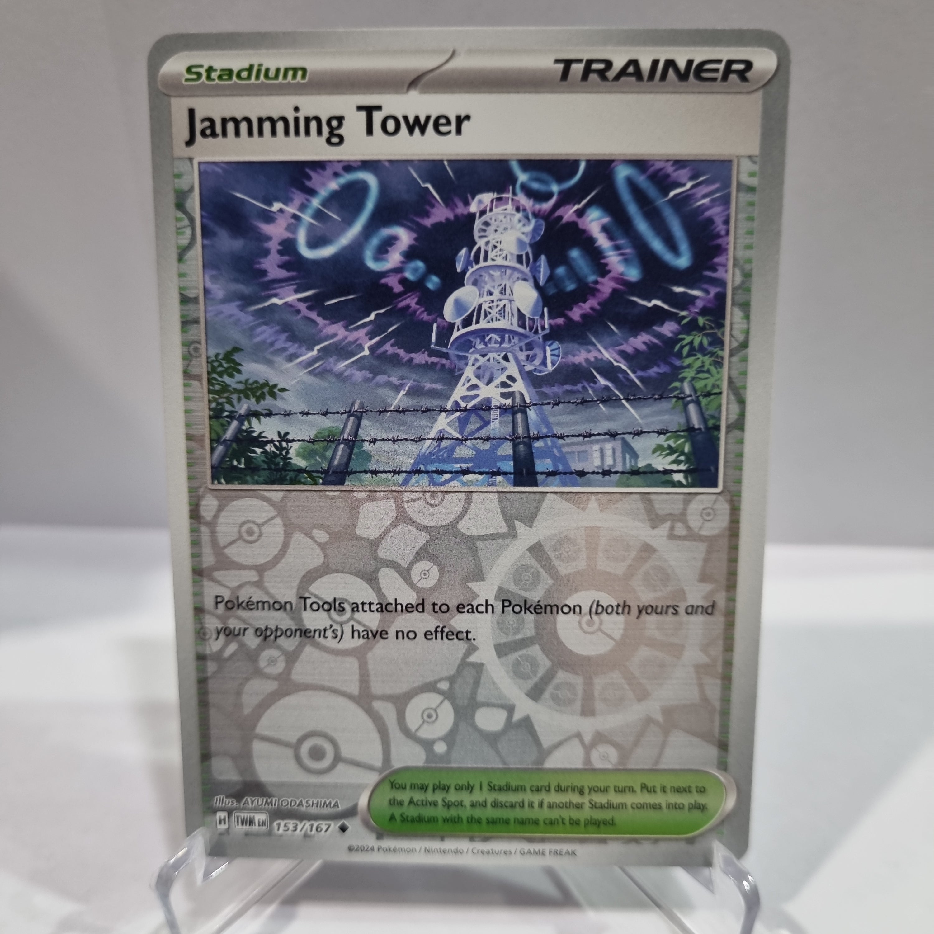 Pokemon TCG Scarlet & Violet expansion Twilight Masquerades. Jamming Tower Reverse Holo card.