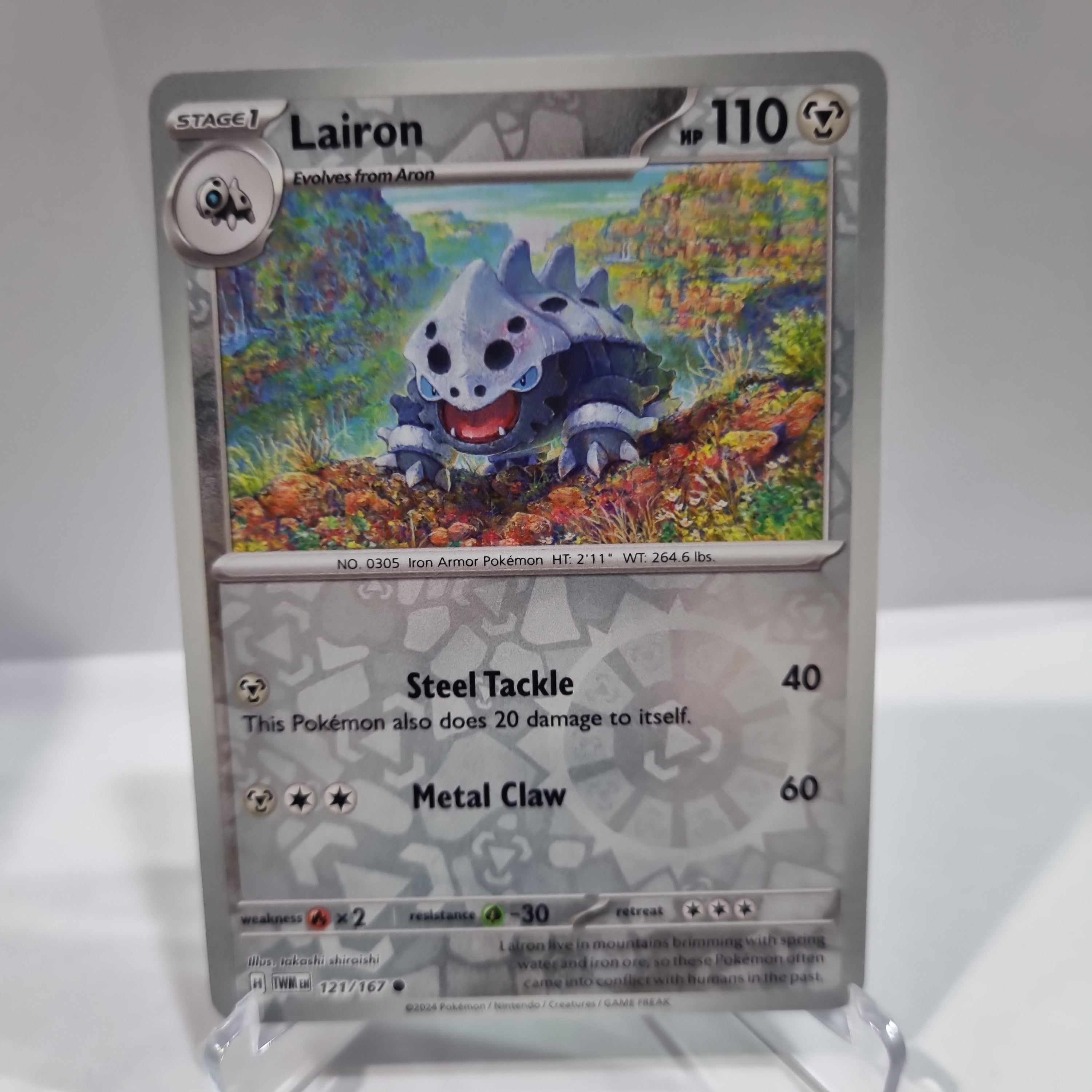 Pokemon TCG Scarlet & Violet expansion Twilight Masquerades. Lairon Reverse Holo card.