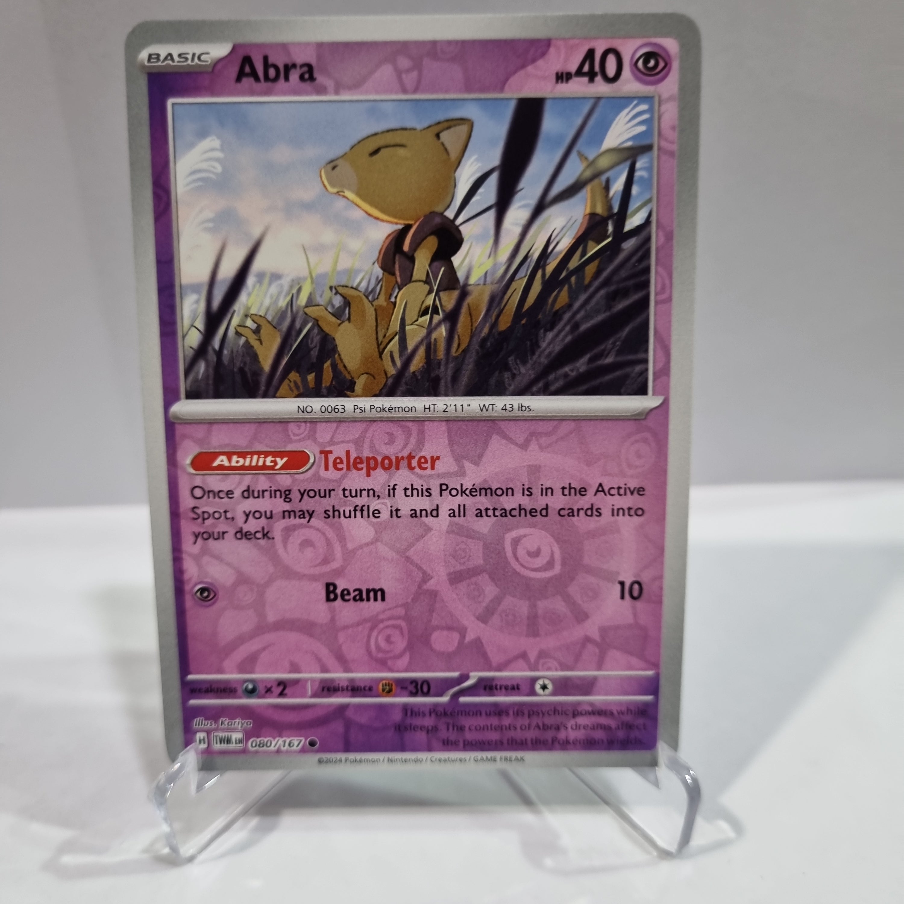 Pokemon TCG Scarlet & Violet expansion Twilight Masquerades. Abra Reverse Holo card.