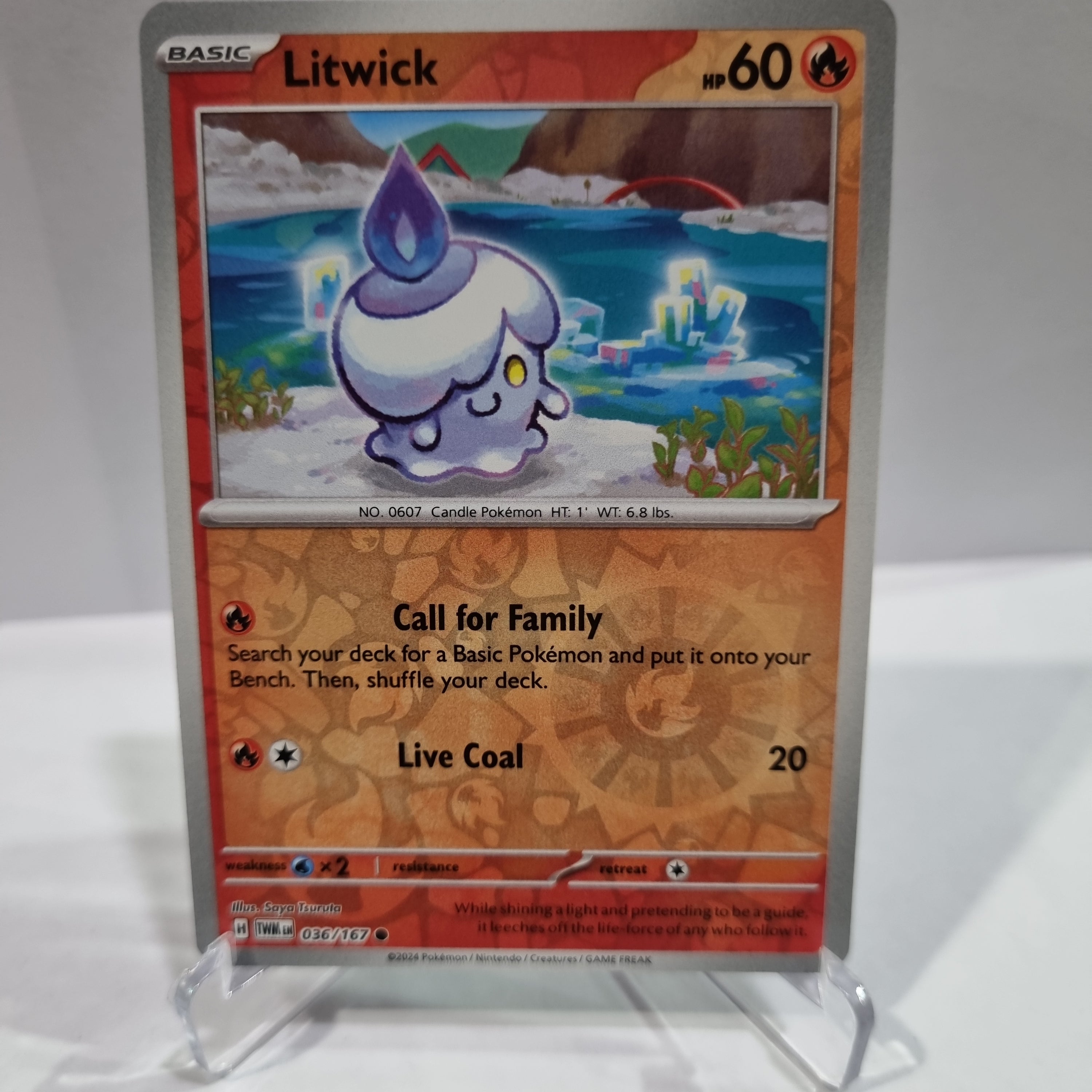 Pokemon TCG Scarlet & Violet expansion Twilight Masquerades. Litwick Reverse Holo card.