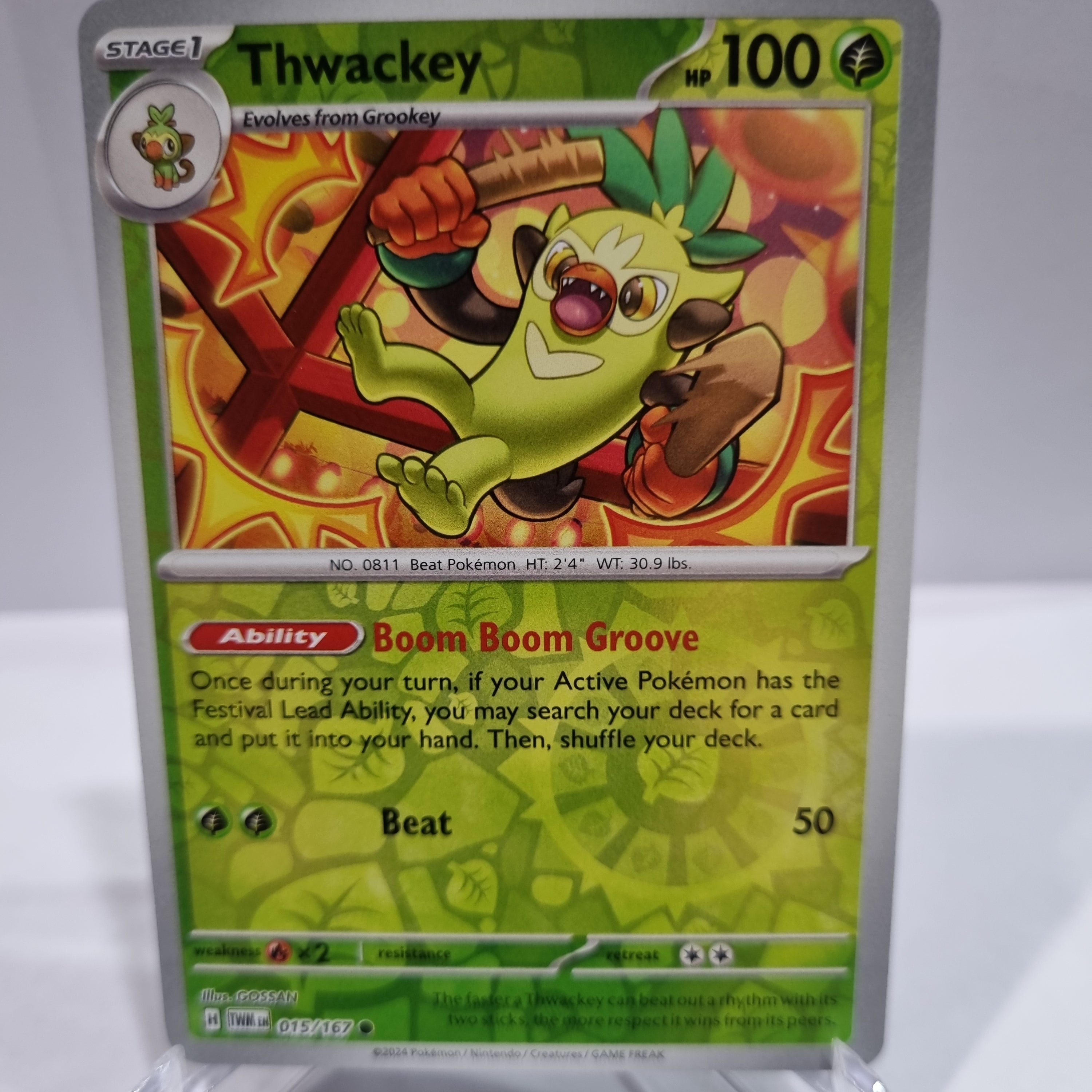 Pokemon TCG Scarlet & Violet expansion Twilight Masquerades. Thwackey Reverse Holo card.