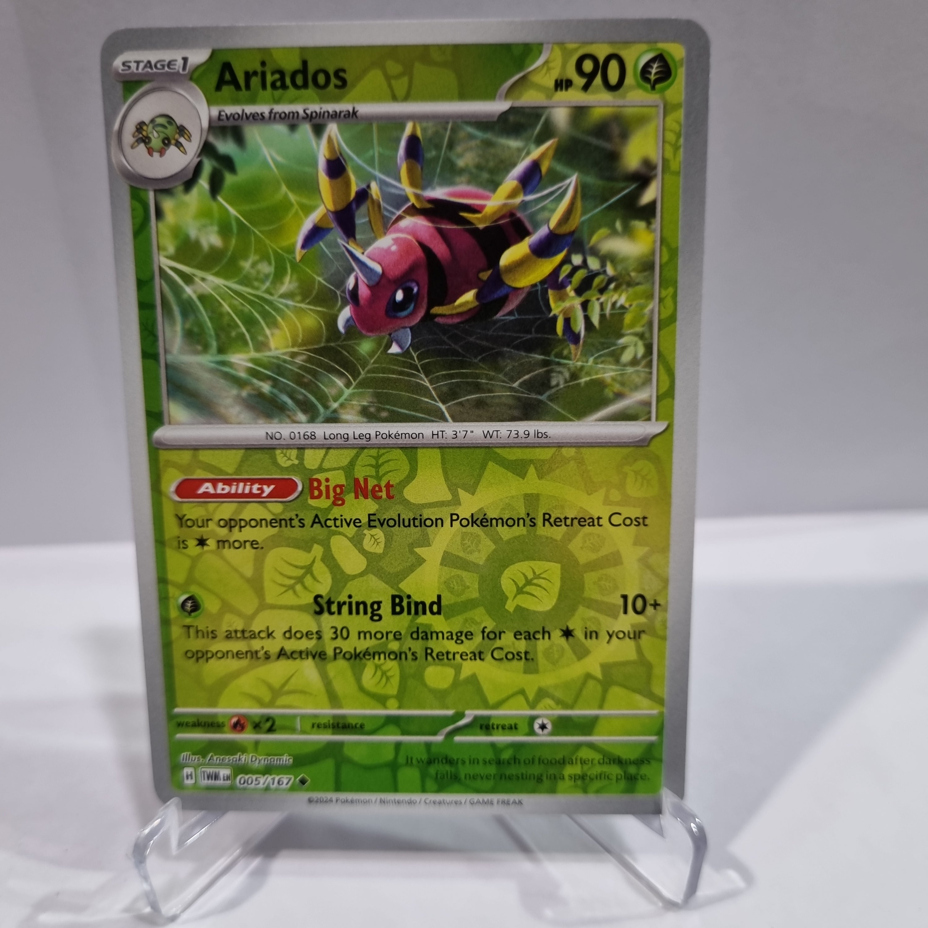 Pokemon TCG Scarlet & Violet expansion Twilight Masquerades. Ariados Reverse Holo card.