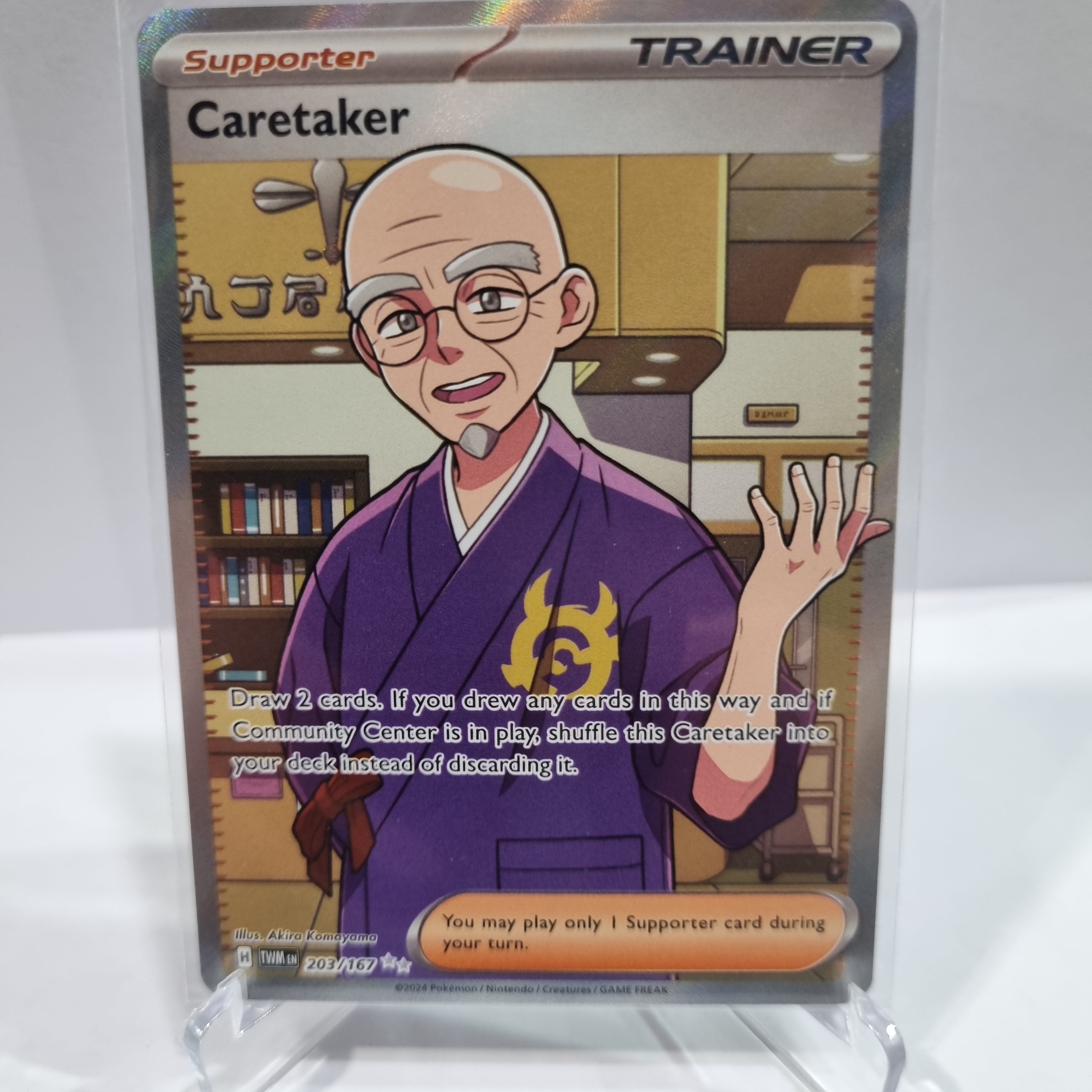 Pokemon TCG Scarlet & Violet expansion Twilight Masquerades. Caretaker Ultra Rare.