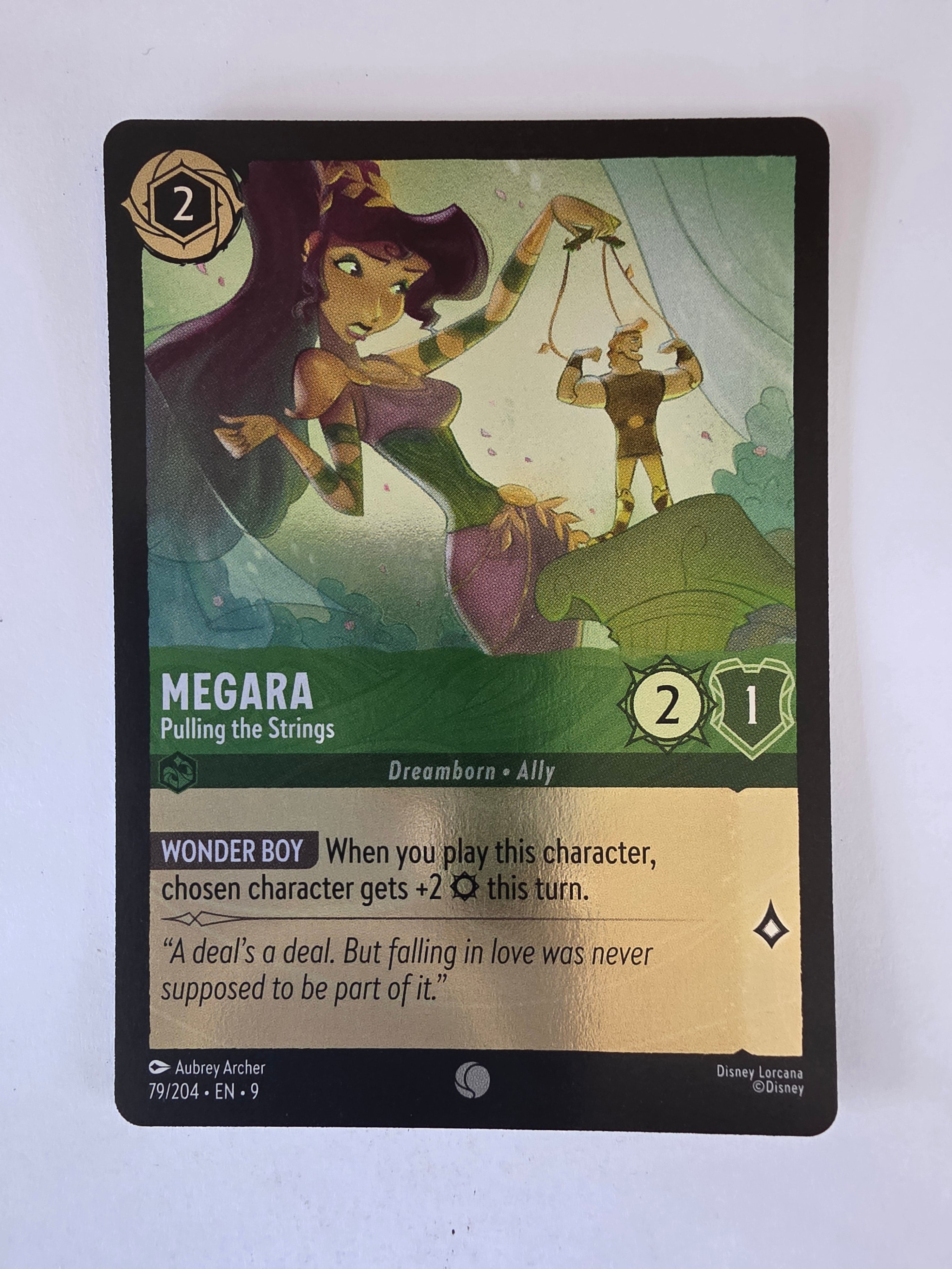 Disney Lorcana | Fabled | 79/204 |COLDFOIL |Megara - Pulling the Strings |Common