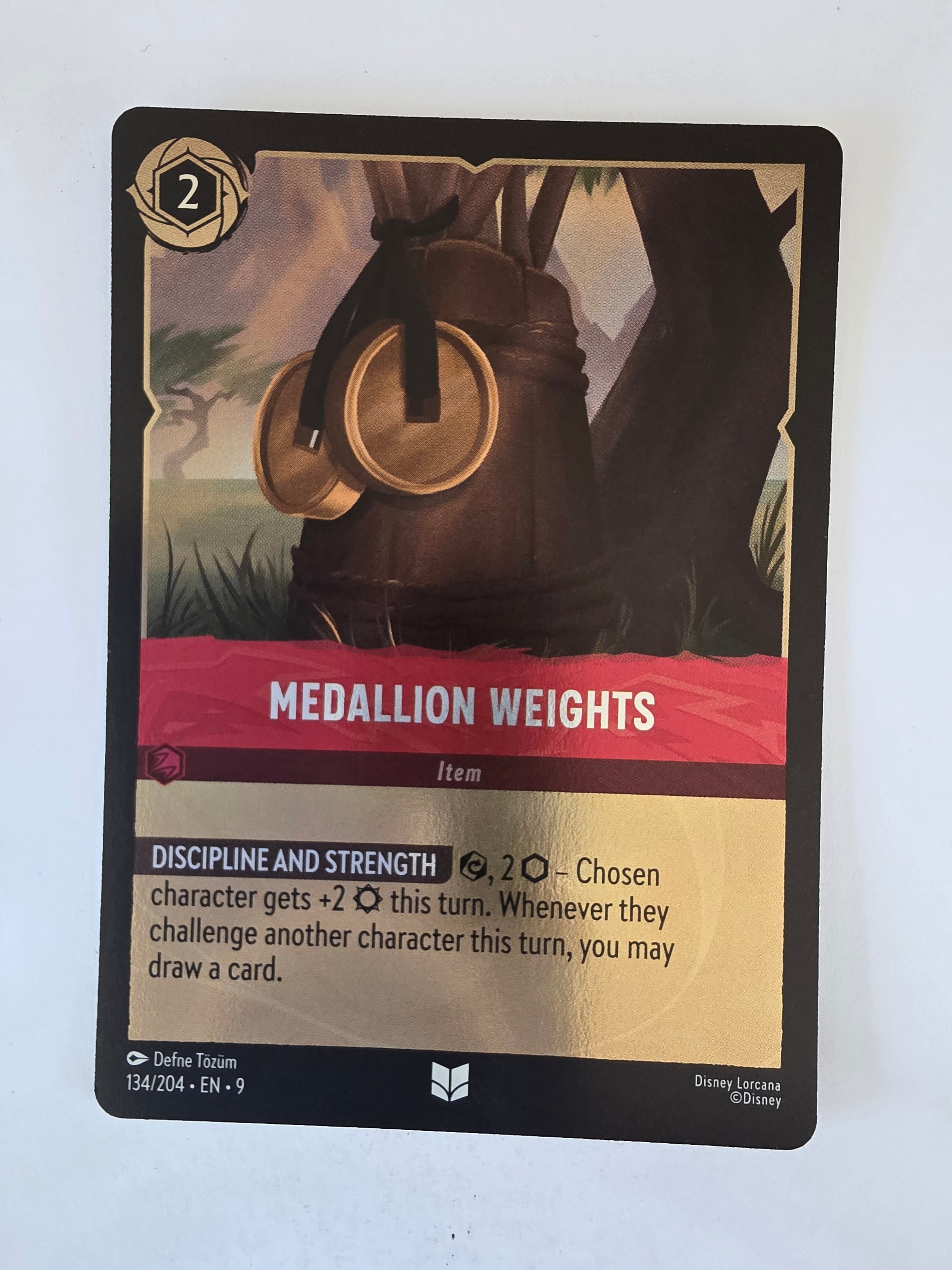 Disney Lorcana | Fabled | 134/204 | COLDFOIL | Medallion Weights | Uncommon