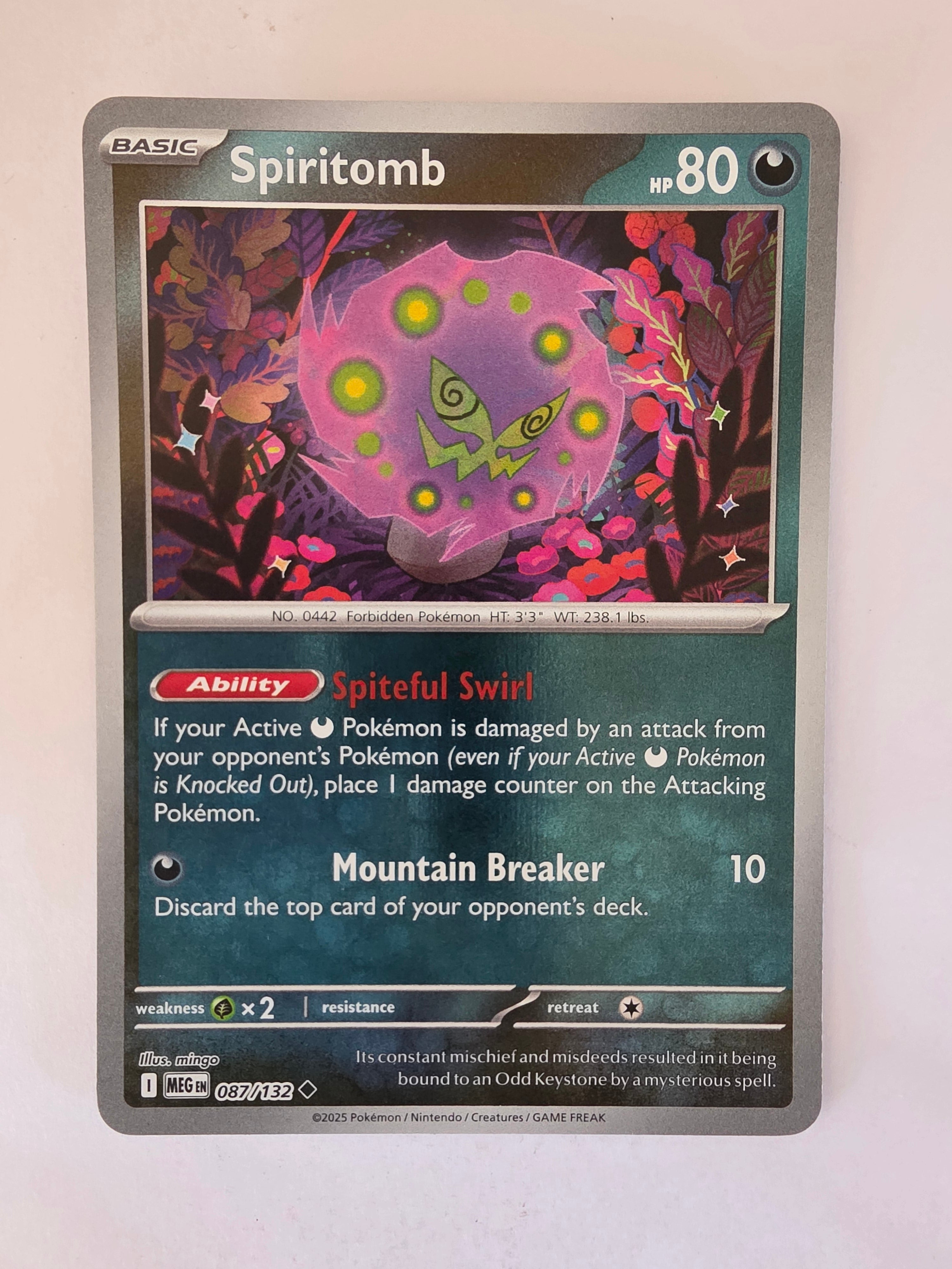 Pokémon trading card featuring Spiritomb on a white background