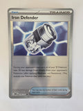 Pokémon trading card featuring Iron Defender on a light gray background