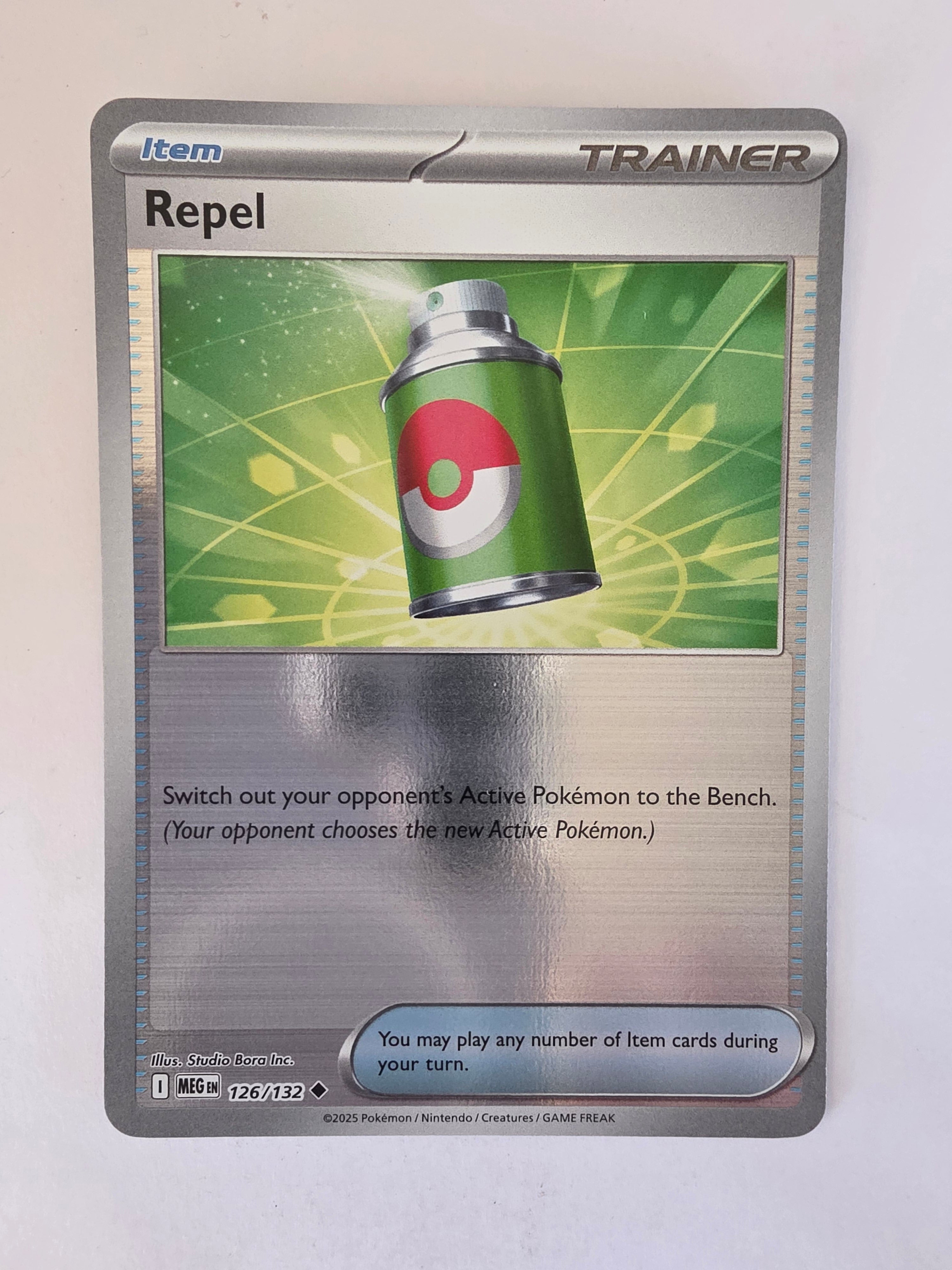 Pokémon trading card with a can-shaped item on a green background