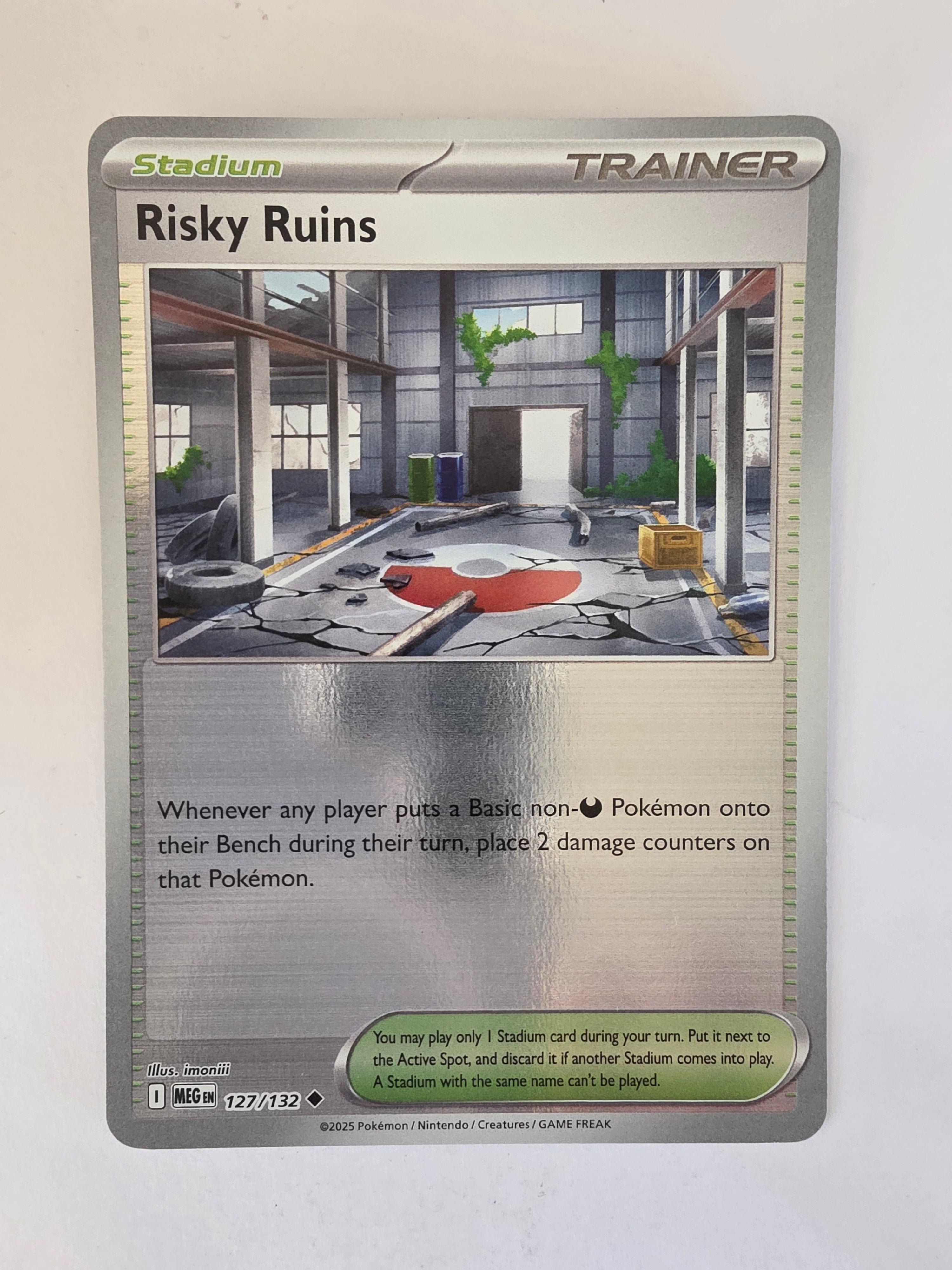 Pokémon trading card with a stadium design and 'Risky Ruins' text on a white background
