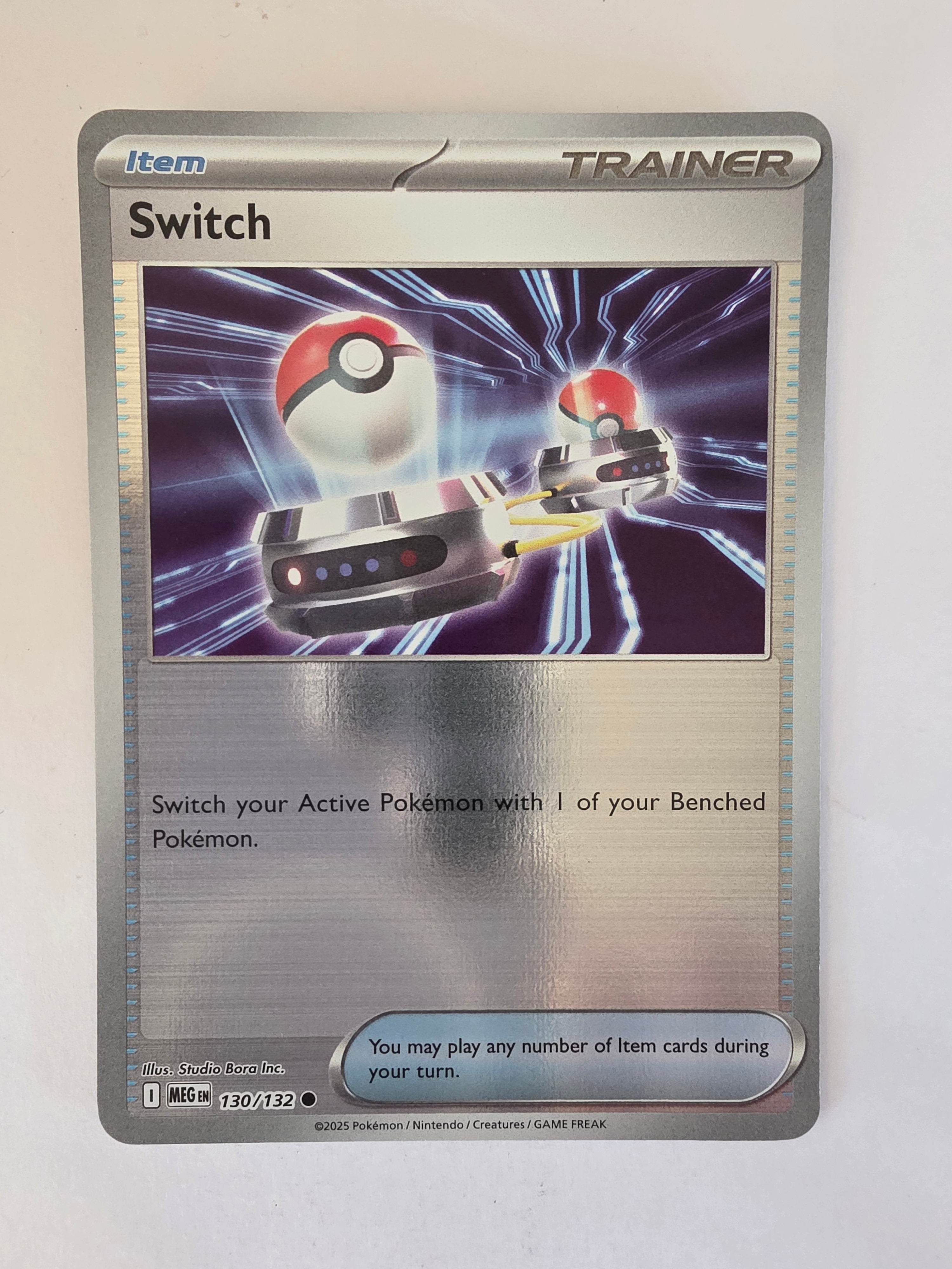 Pokémon trading card featuring a trainer item with a Poké Ball design on a white background