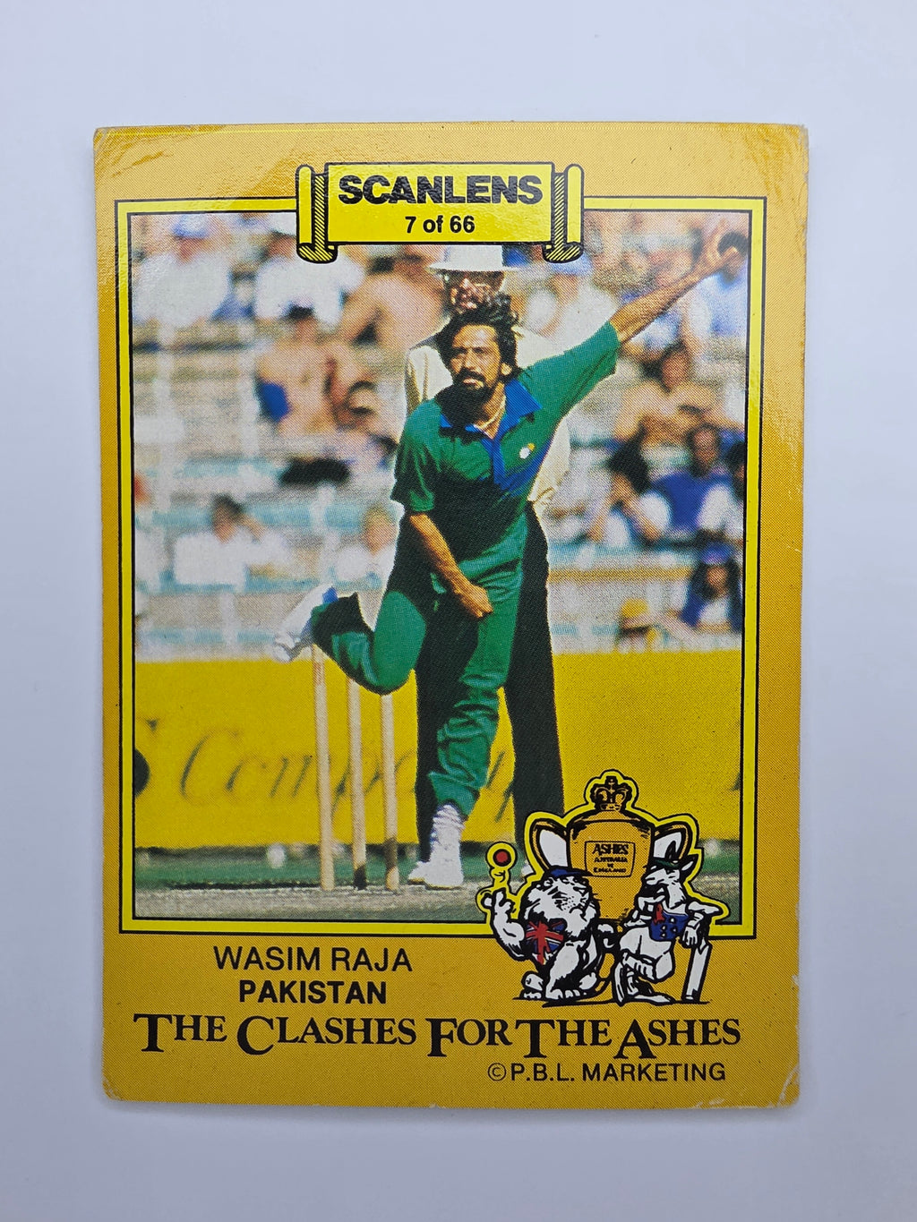 Scanlens 1986 Clashes for the Ashes cricket trading card featuring Wasim Raja bowling for Pakistan.