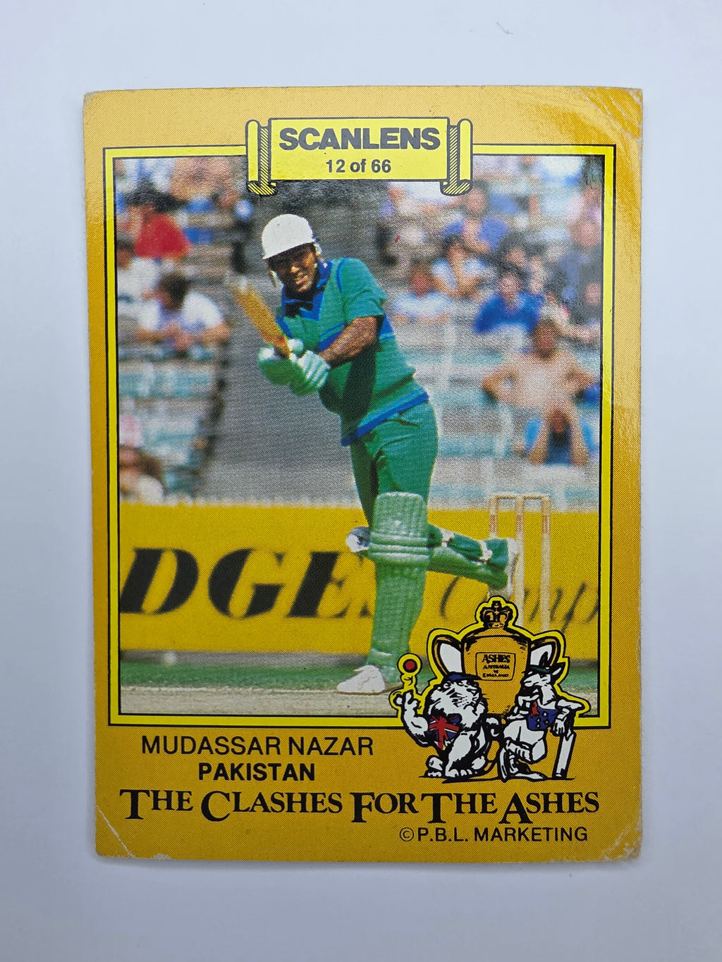 1986 Scanlens Clashes for the Ashes cricket trading card featuring Mudassar Nazar batting for Pakistan.
