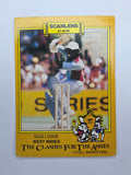 1986 Scanlens Clashes for the Ashes cricket trading card featuring Gus Logie batting for the West Indies.