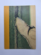 Scanlens 1986 cricket trading card from the Clashes for the Ashes featuring Roger Harper bowling for the West Indies.