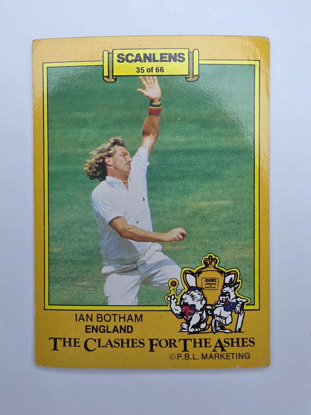 Scanlens 1986 Clashes for the Ashes cricket trading card featuring Ian Botham bowling for England.