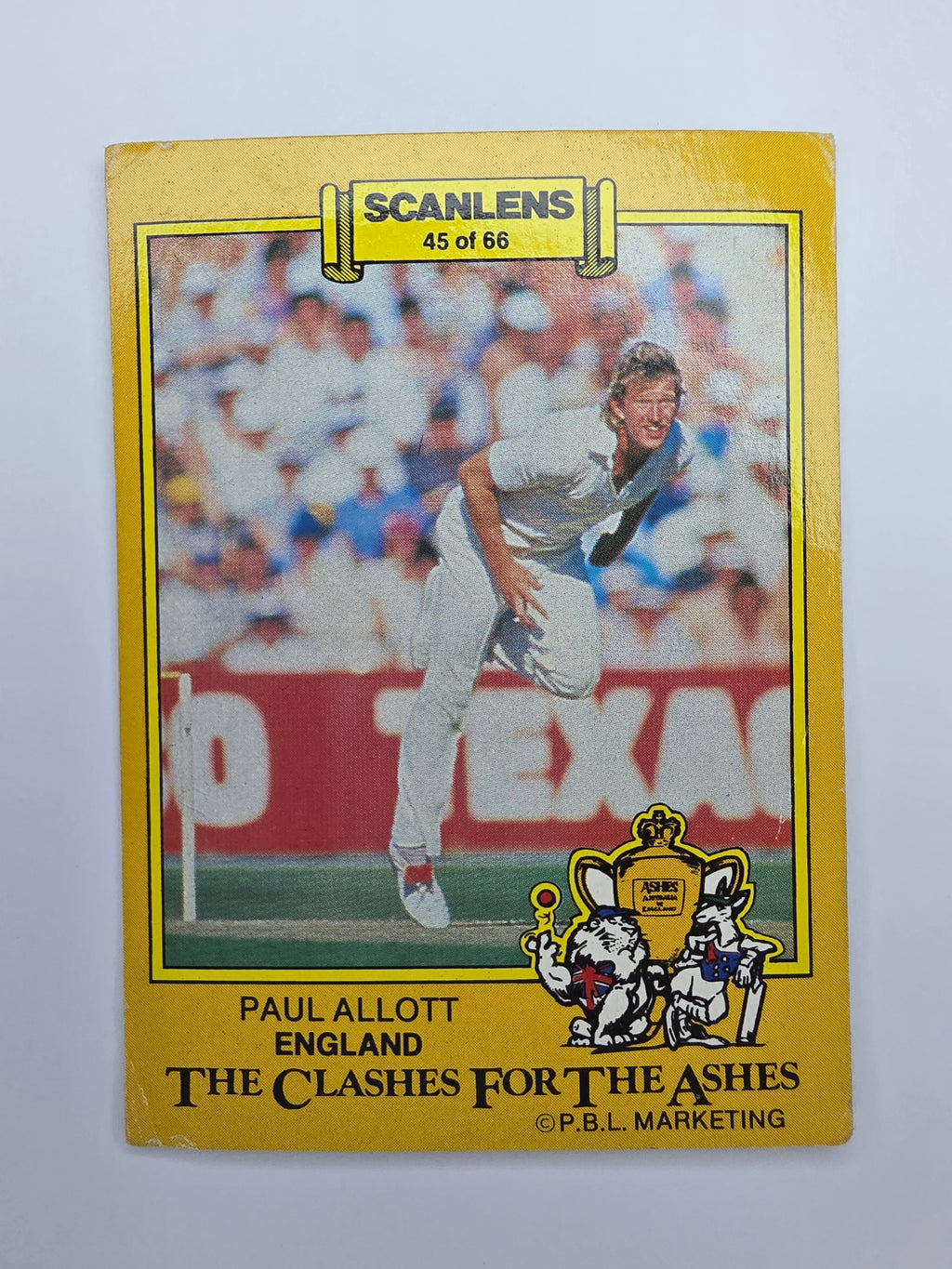 1986 Scanlens The Clashes for the Ashes cricket trading card featuring Paul Allott bowling for England.