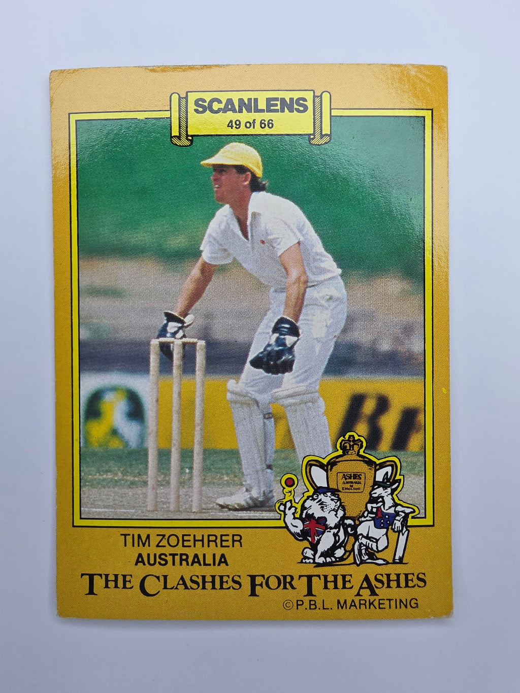 1986 Scanlens The Clashes for the Ashes cricket trading card featuring Tim Zoehrer wicket keeping for Australia.
