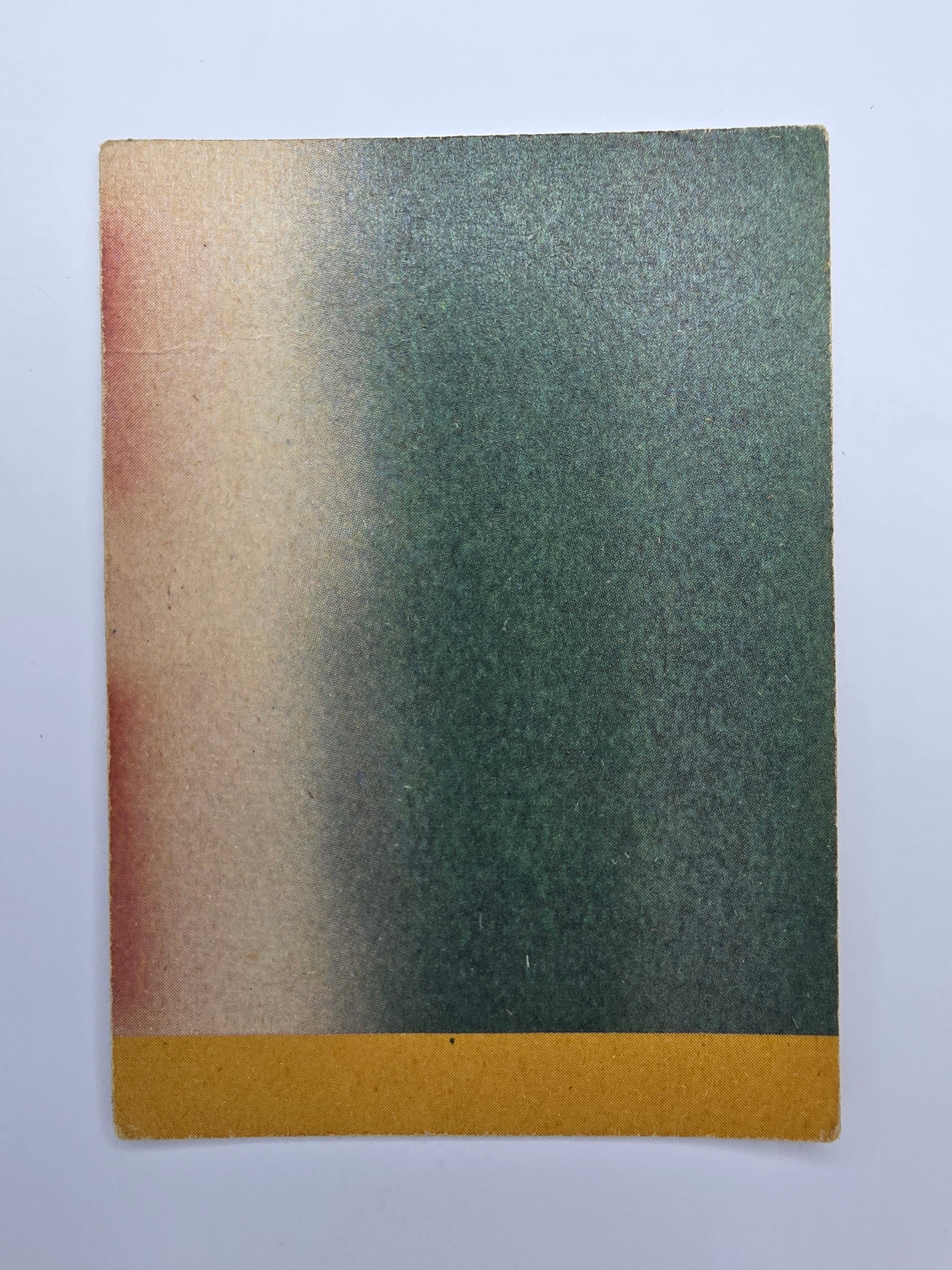 Rectangular piece of trading cardboard with a gradient from green to brown on a white background. Makes up a larger image when combined with cards from set.