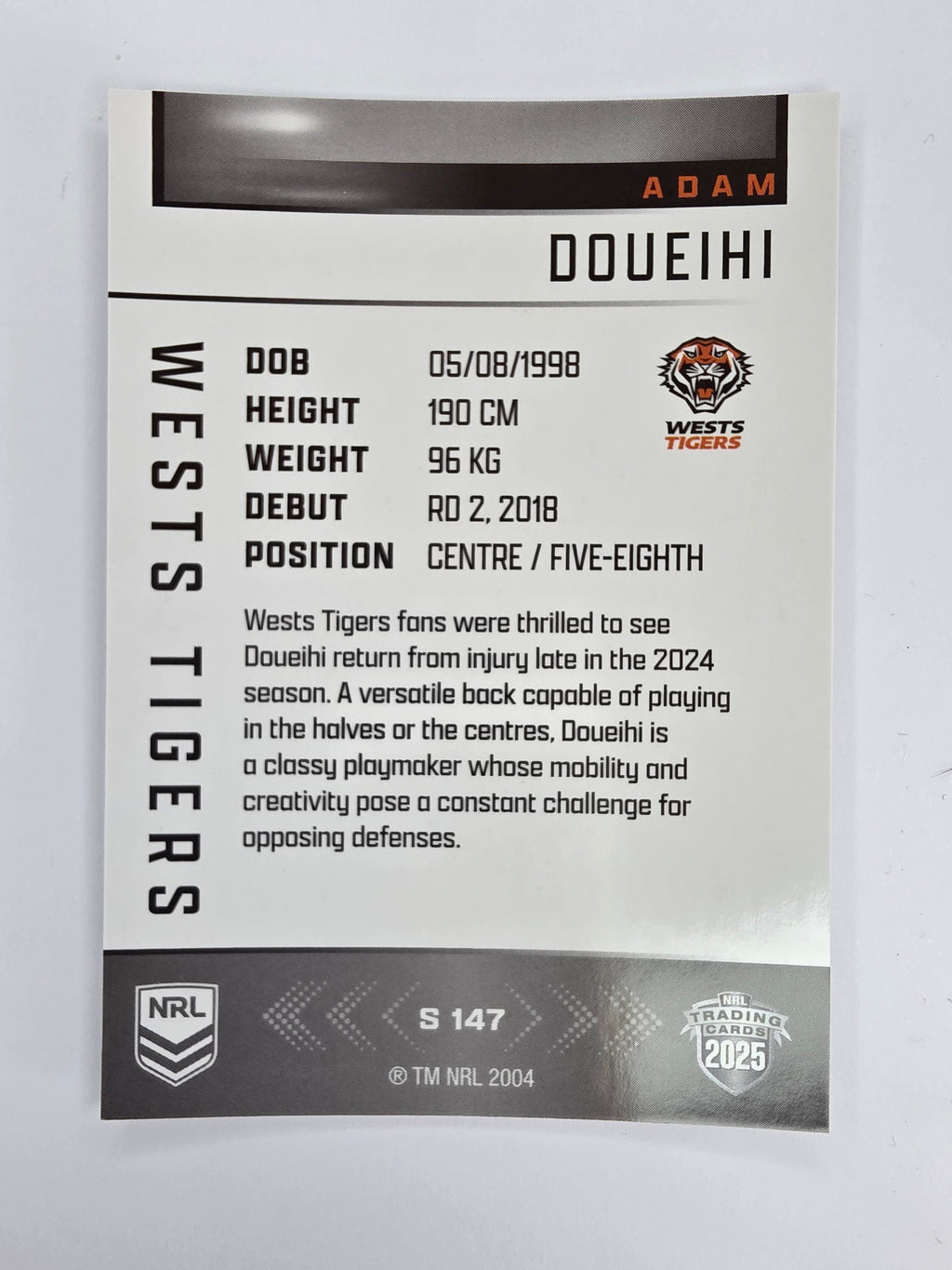 NRL 2025 Elite | Silver Parallel | #S147 | Adam Doueihi | Tigers