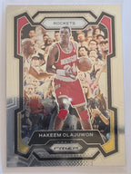 2023-24 Panini Prizm | White Sparkle Prizm Parallel | #191 | Hakeem Olajuwon | Houston Rockets
