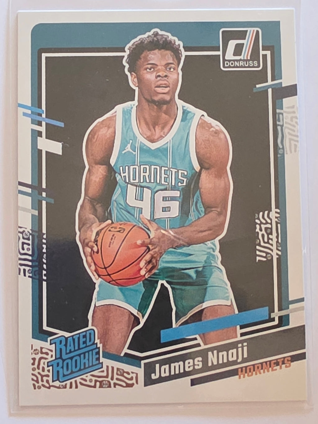 2023-24 Panini Donruss | Rated Rookie | #215 | James Nnaji | Charlotte Hornets