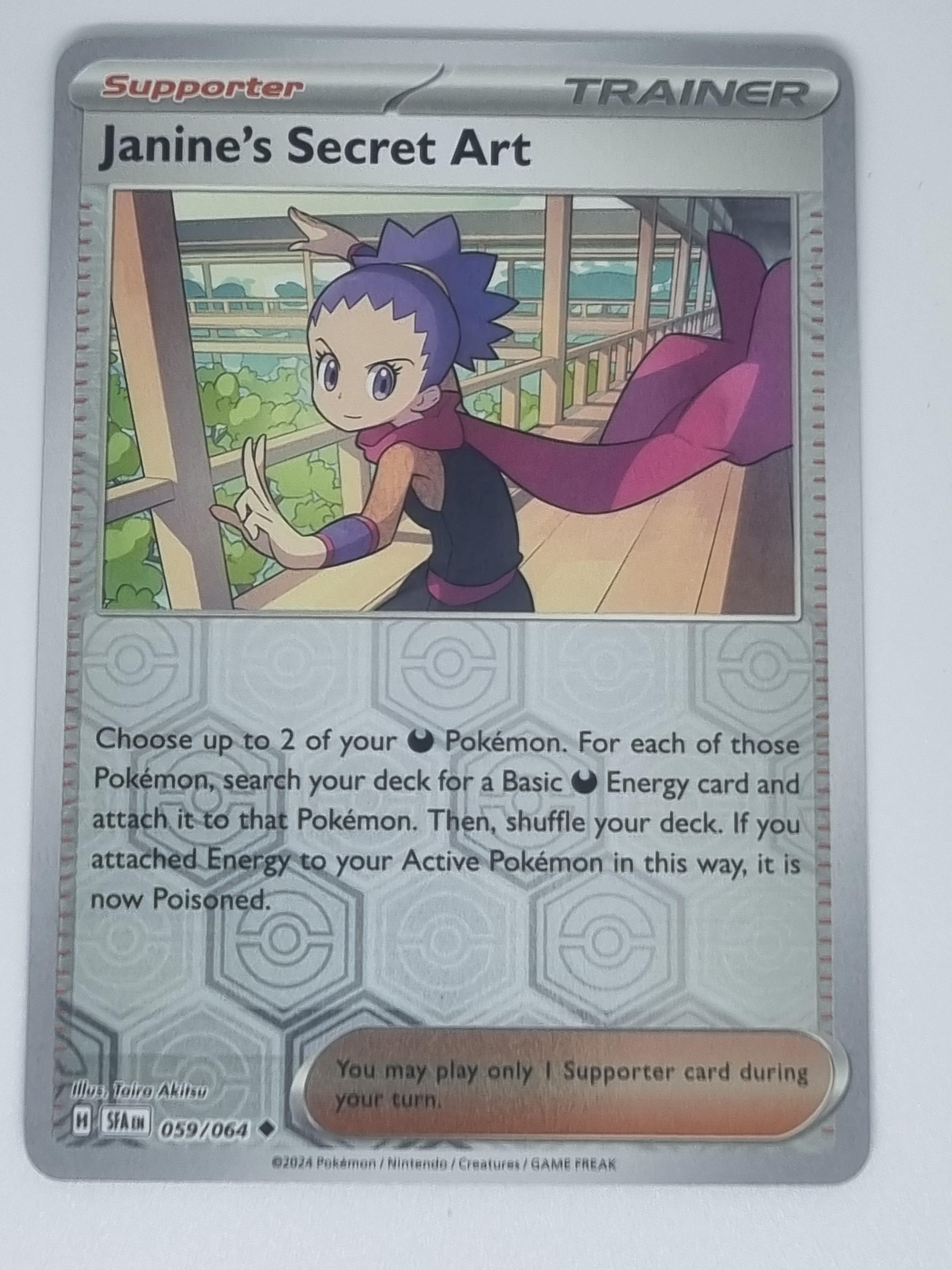 Pokemon TCG: Shrouded Fable uncommon reverse holo card - Janine's Secret Art.