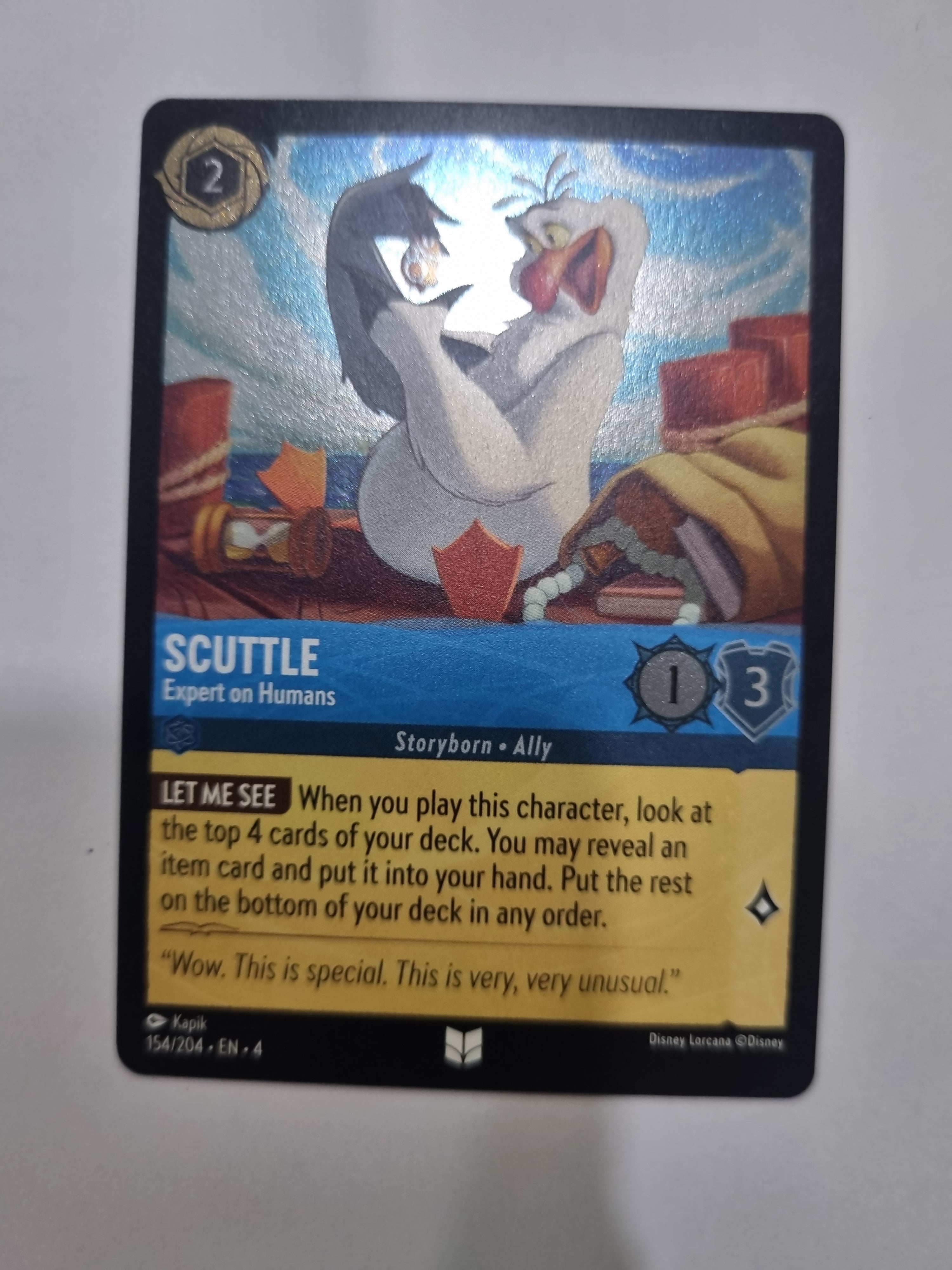 Ursula's Return - Coldfoil - Scuttle - Expert on Humans - 154/204 - Uncommon