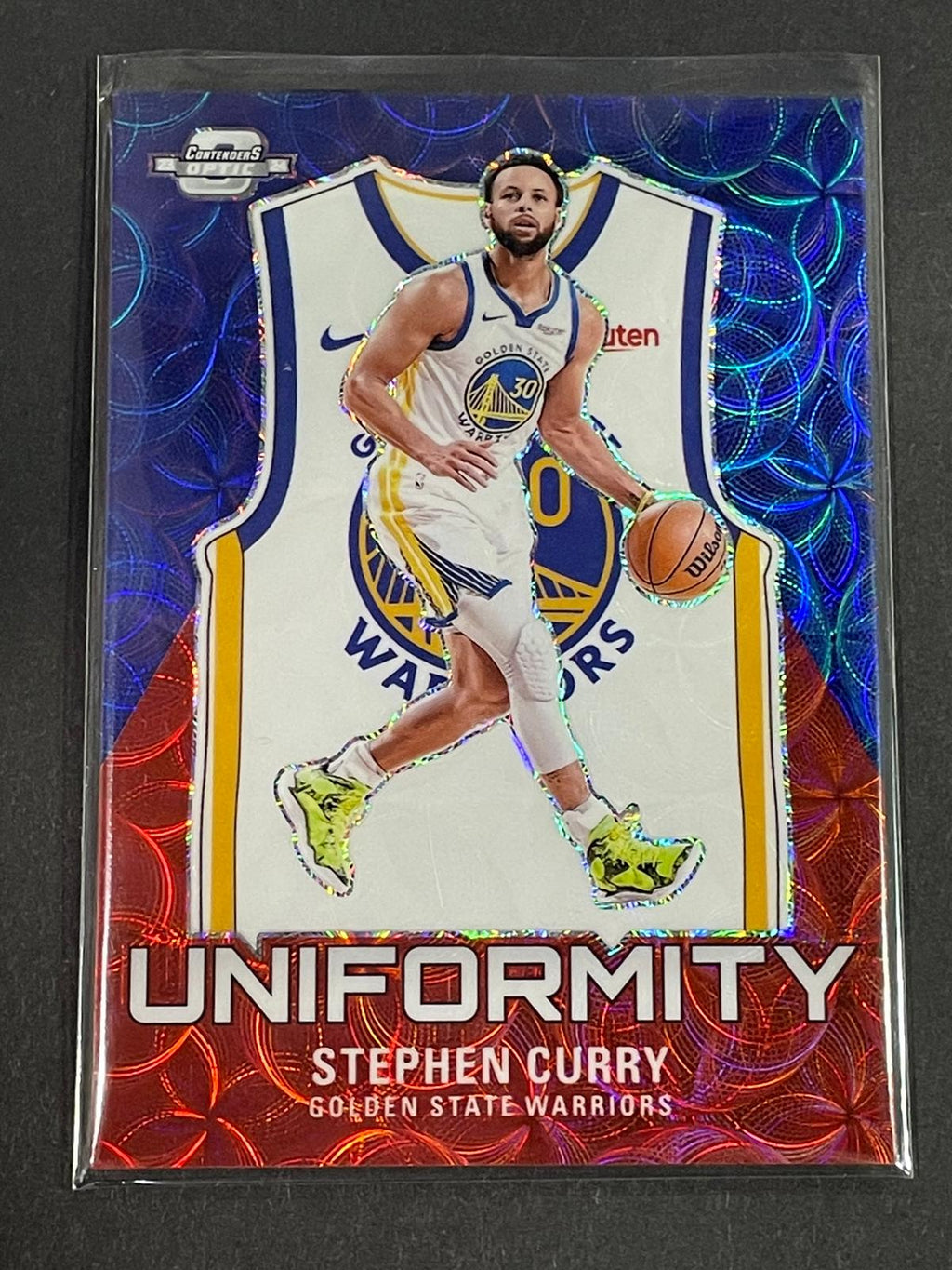 Basketball trading card of Stephen Curry in a Warriors uniform with 'Uniformity' text.