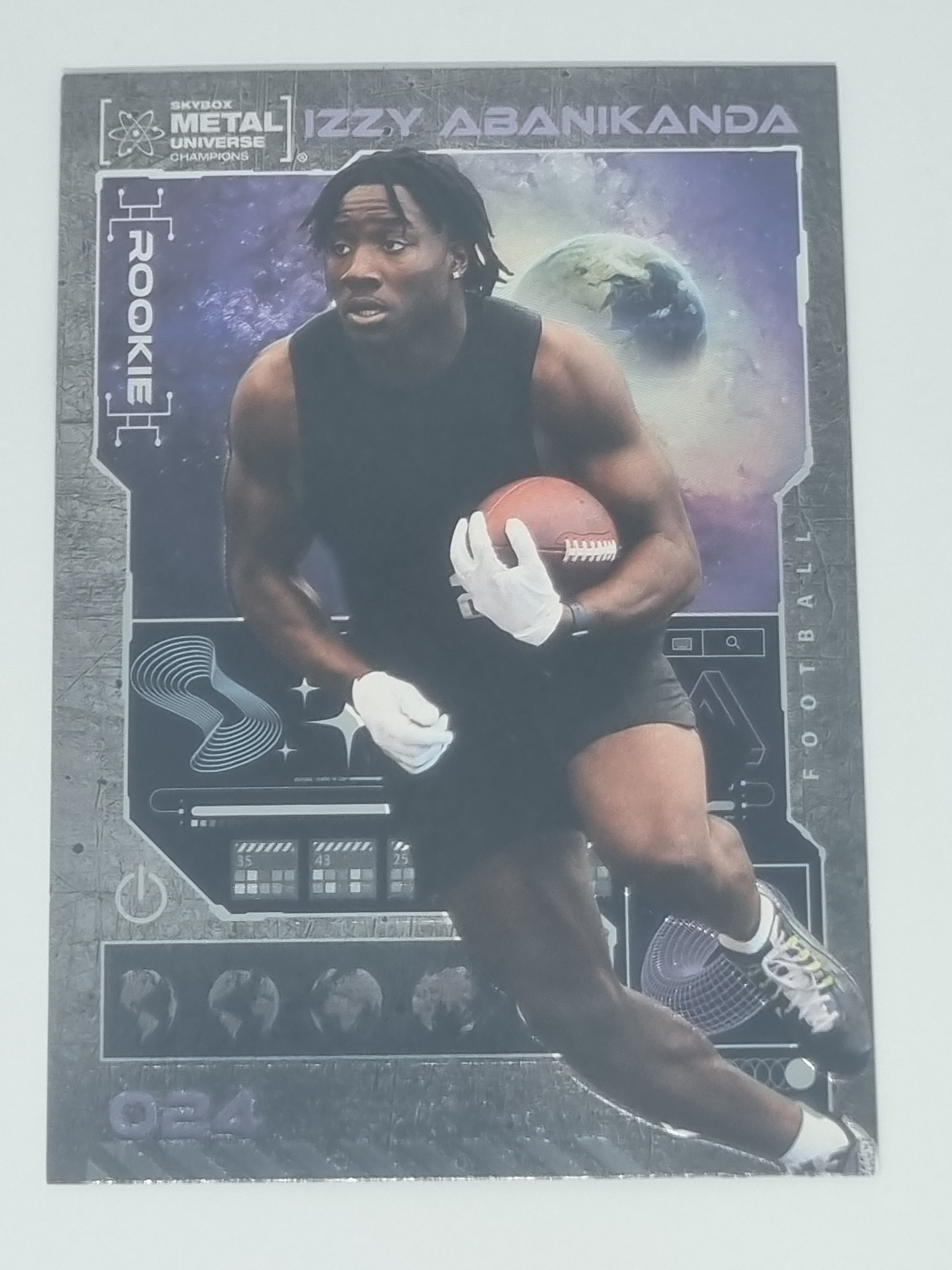 2023 Skybox Metal Universe Champions - #024 - Izzy Abanikanda