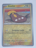 Pokemon TCG - Surging Sparks - #064/191 - Reverse Holo - Stunfisk - Common