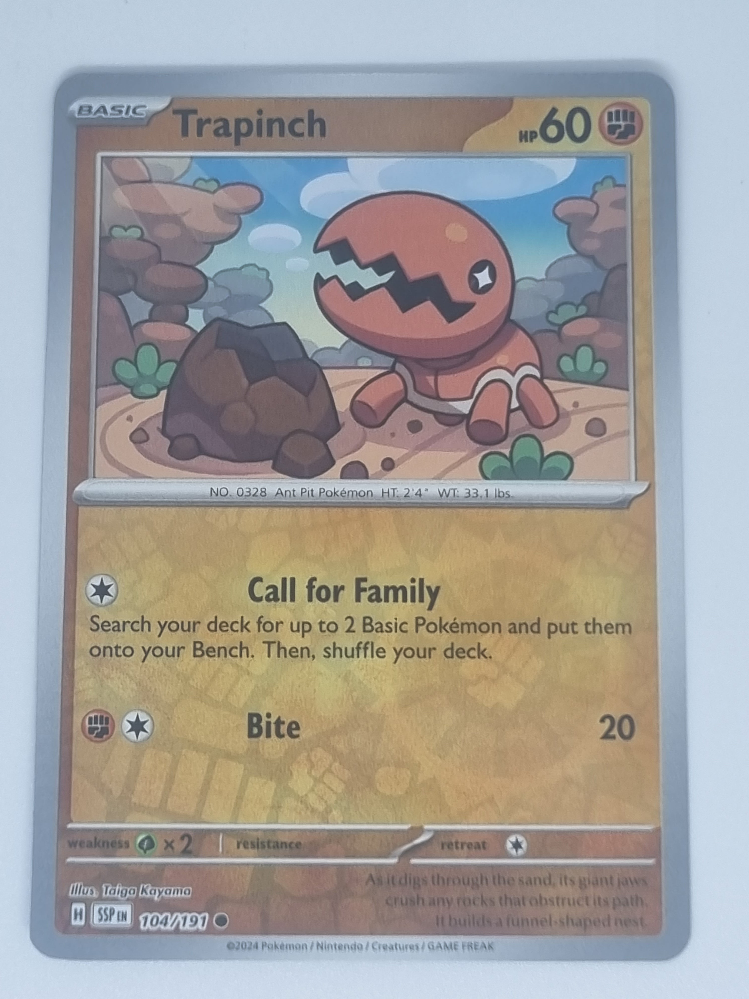 Pokemon TCG - Surging Sparks - #104/191 - Reverse Holo - Trapinch - Common